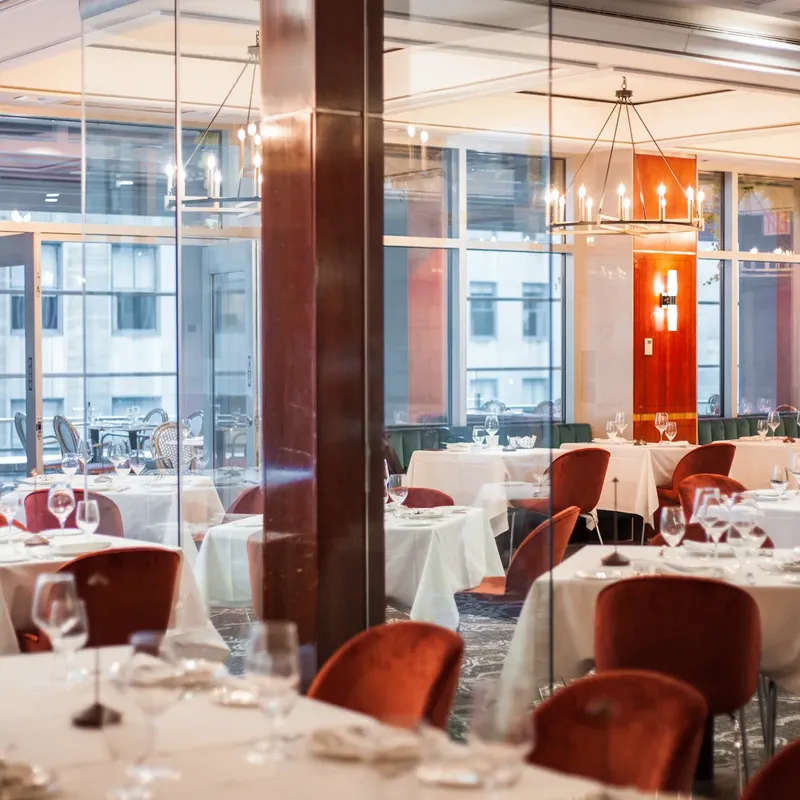 The dining room, tables set for dinner